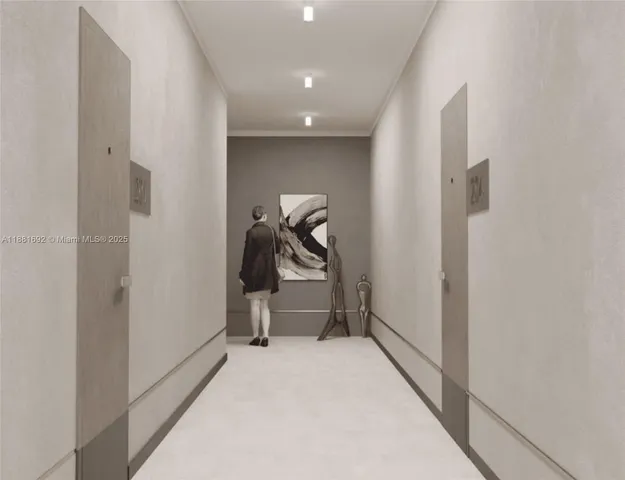 a view of staircase with railing and white walls