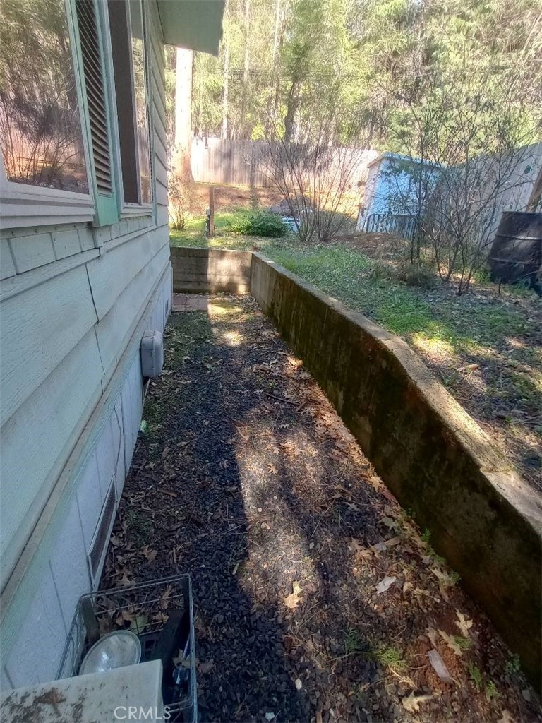 14786 Masterson Way Magalia, CA 95954 - Photo 41 of 51 Walkway all around the house