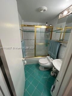 Hialeah Hialeah, FL 33016 - Photo 6 of 8 a bathroom with a toilet and a shower