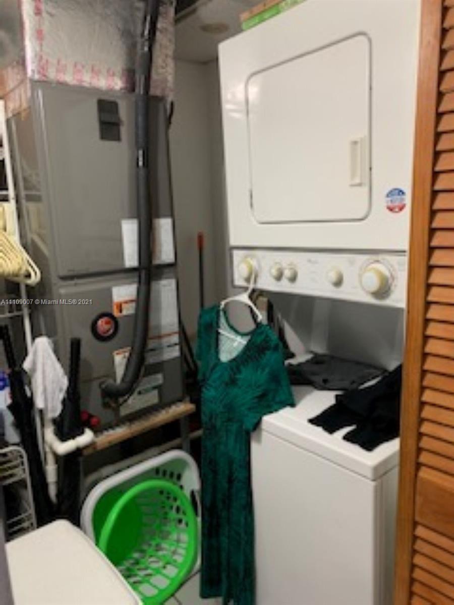 Hialeah Hialeah, FL 33016 - Photo 7 of 8 a bathroom with a toilet and a sink