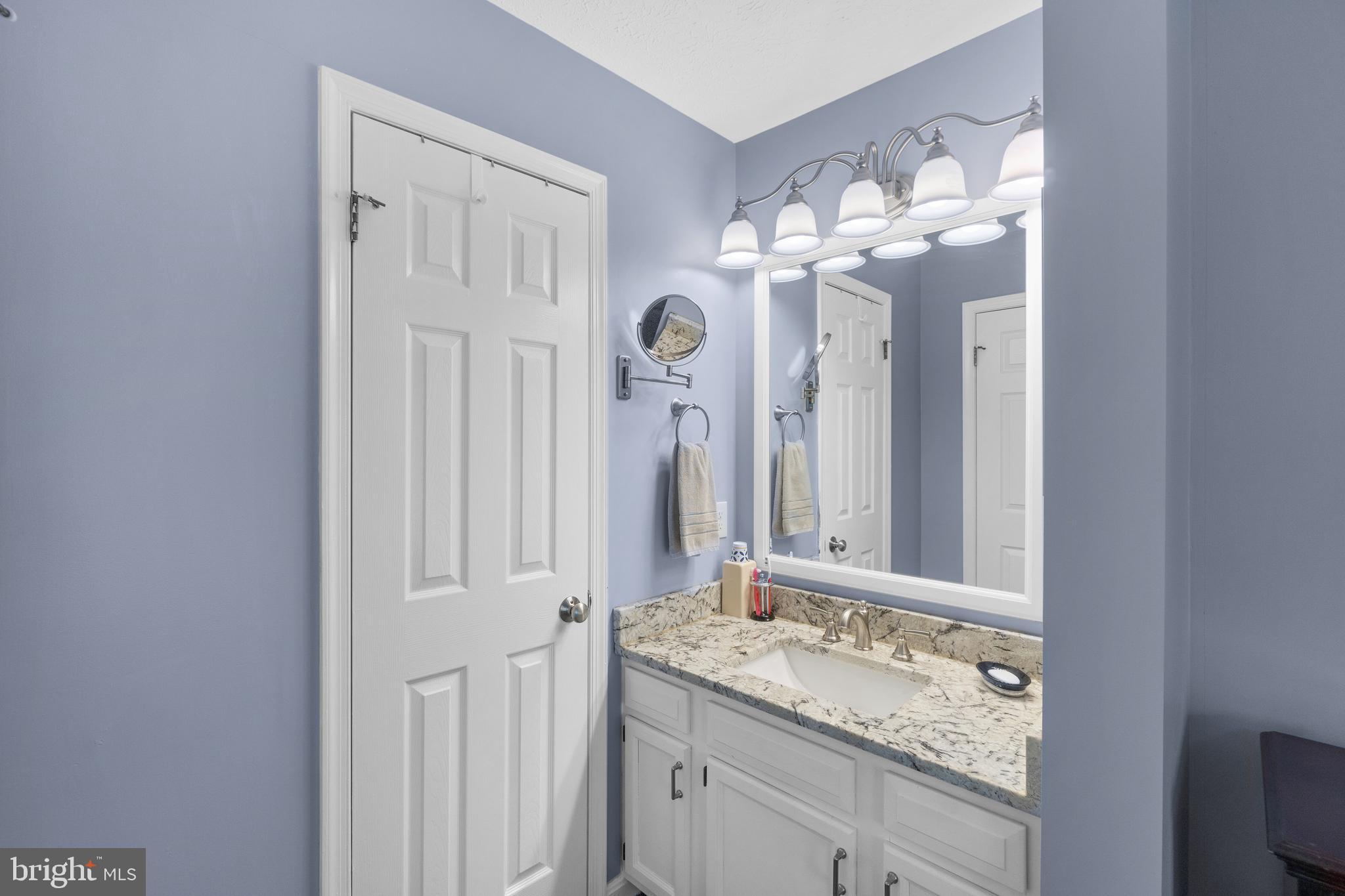 7708 West Shore Road Pasadena, MD 21122 - Photo 16 of 31 Sink vanity outside private bath