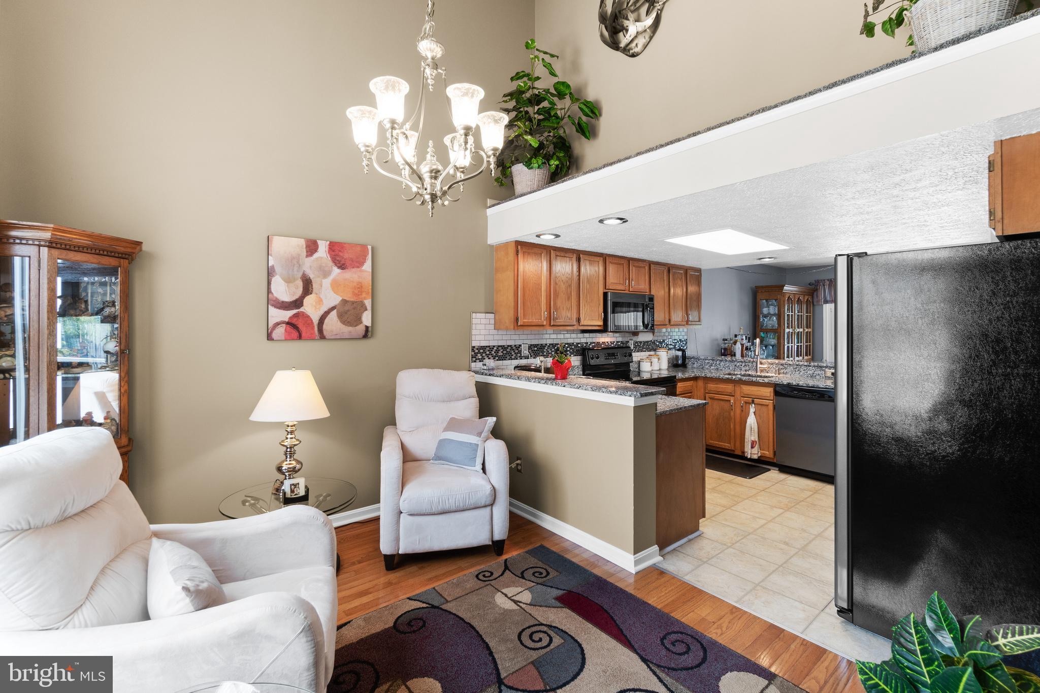 Formal living room open to kitchen