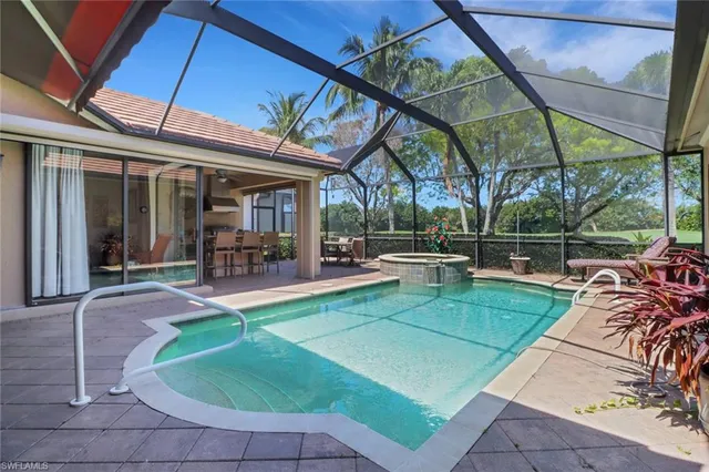 a view of a swimming pool with a porch