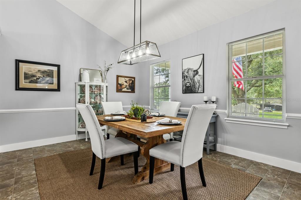 32530 Senese Road Sorrento, FL 32776 - Photo 19 of 34 a view of a dining room with furniture window and outside view