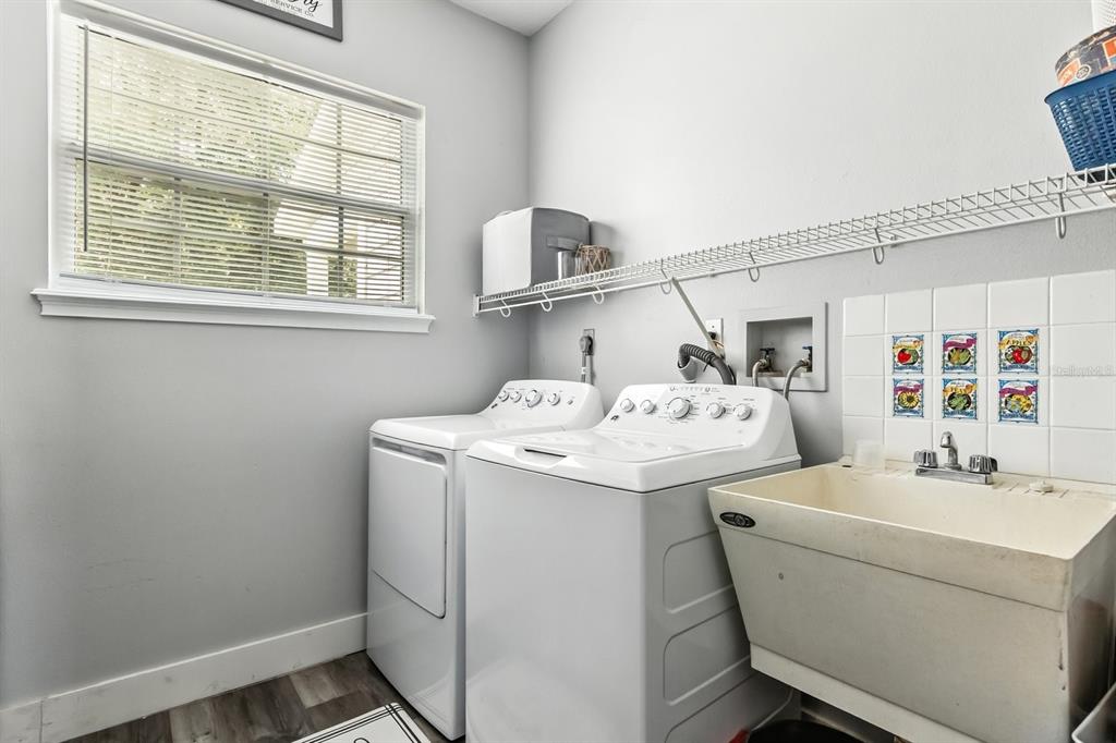 32530 Senese Road Sorrento, FL 32776 - Photo 26 of 34 a utility room with dryer and washer