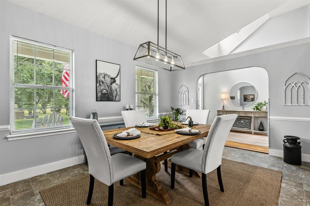 32530 Senese Road Sorrento, FL 32776 - Photo 4 of 34 a view of a dining room with furniture window and wooden floor