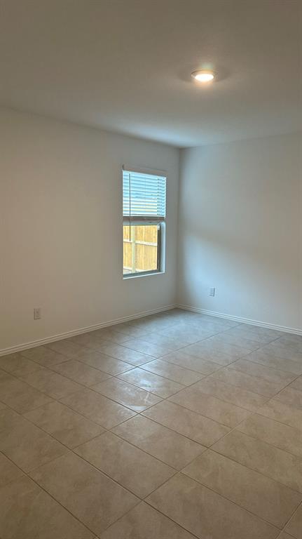 14821 Firerock Road Haslet, TX 76052 - Photo 12 of 35 an empty room with a window