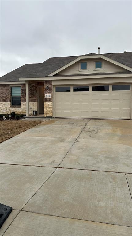 14821 Firerock Road Haslet, TX 76052 - Photo 2 of 35 a bathroom with a sink and a stove