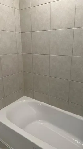 a bathroom with a toilet and a sink