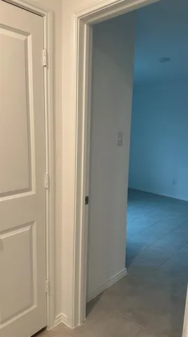 a view of a room with a window