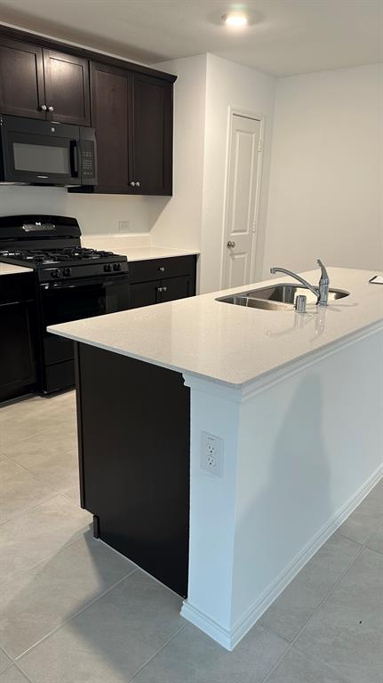 14821 Firerock Road Haslet, TX 76052 - Photo 6 of 35 a kitchen with a sink and cabinets