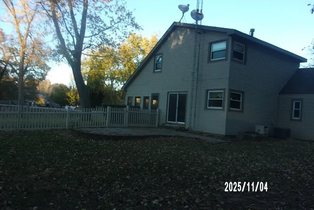 a room with a furniture and wooden floor