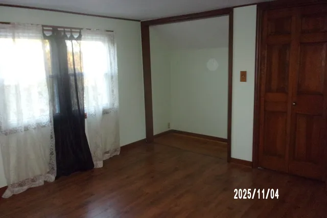 a bathroom with a shower and a sink