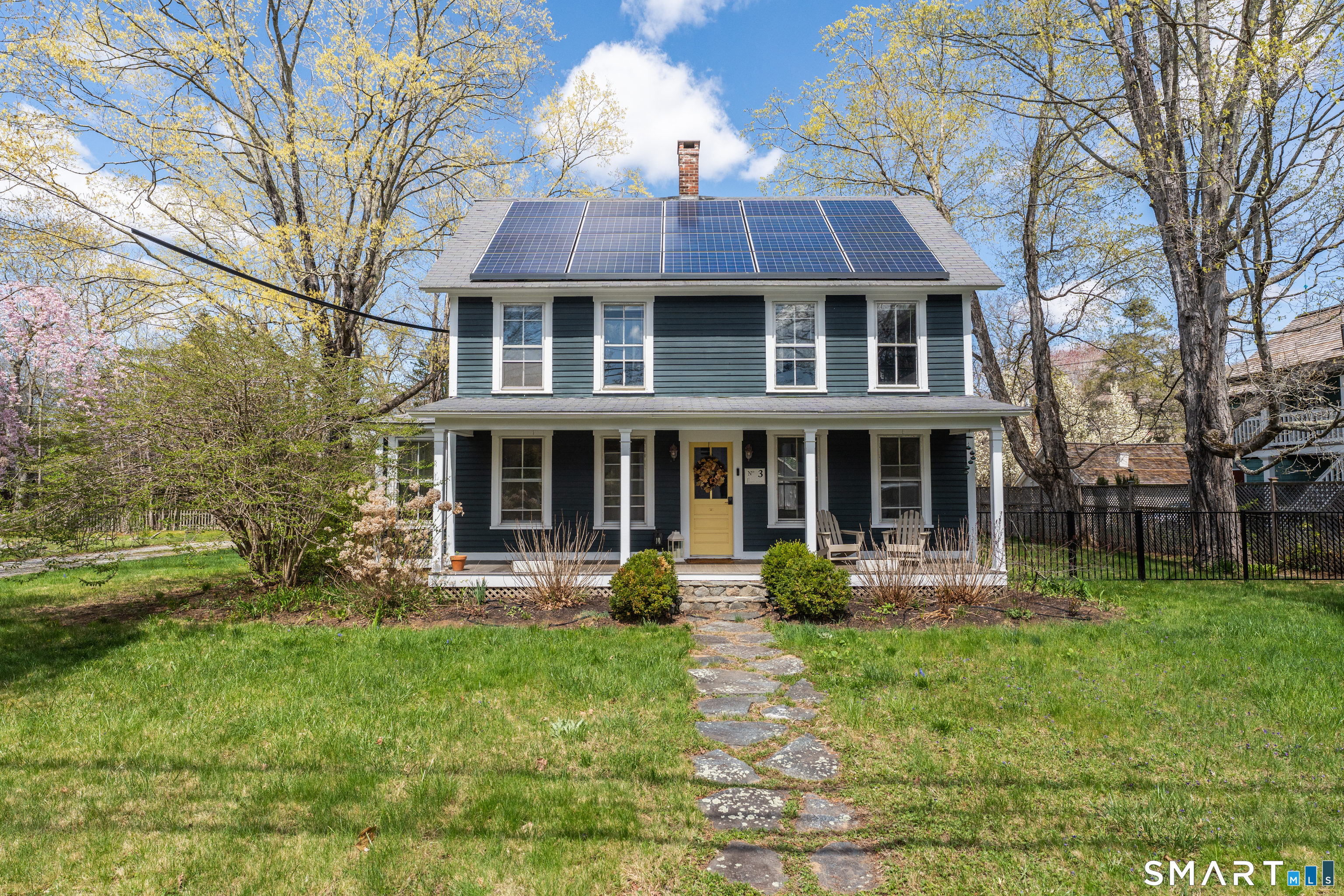 3 Ferry Road Lyme, CT 06371 - Photo 1 of 1 a front view of a house with garden