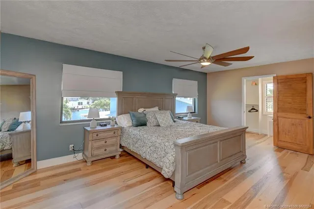 a room that has a window and a dresser