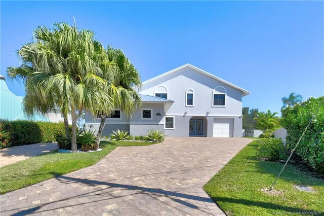 a view of a house with swimming pool