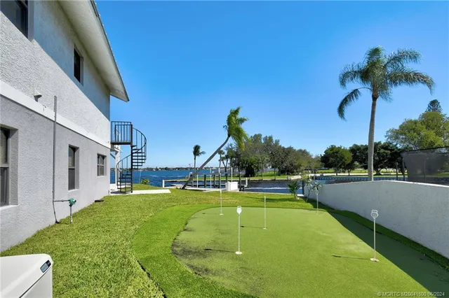 a view of a swimming pool with a lake view