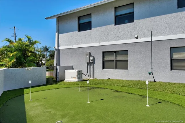 a view of a balcony with chairs
