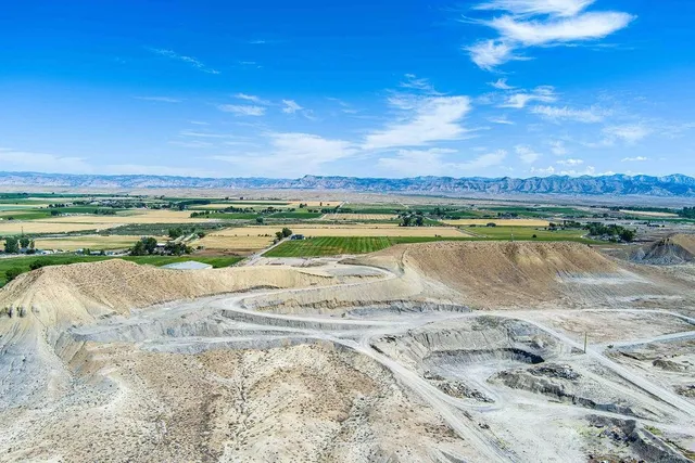 a view of a swimming pool with a lake view