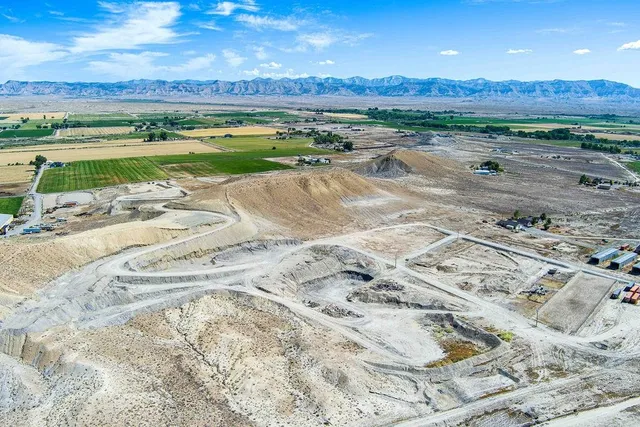 a view of a lake with a house in background