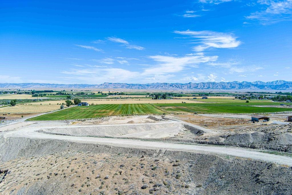 1655 O Road Loma, CO 81524 - Photo 18 of 19 a view of a lake with a house in background