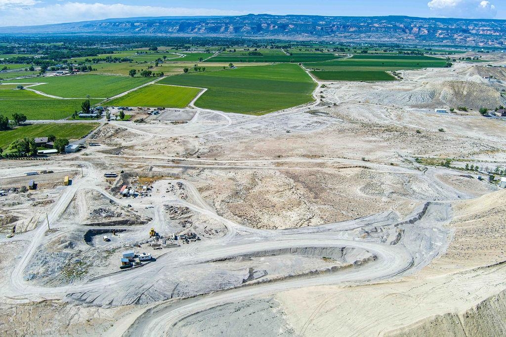 1655 O Road Loma, CO 81524 - Photo 2 of 19 a view of a swimming pool with a yard