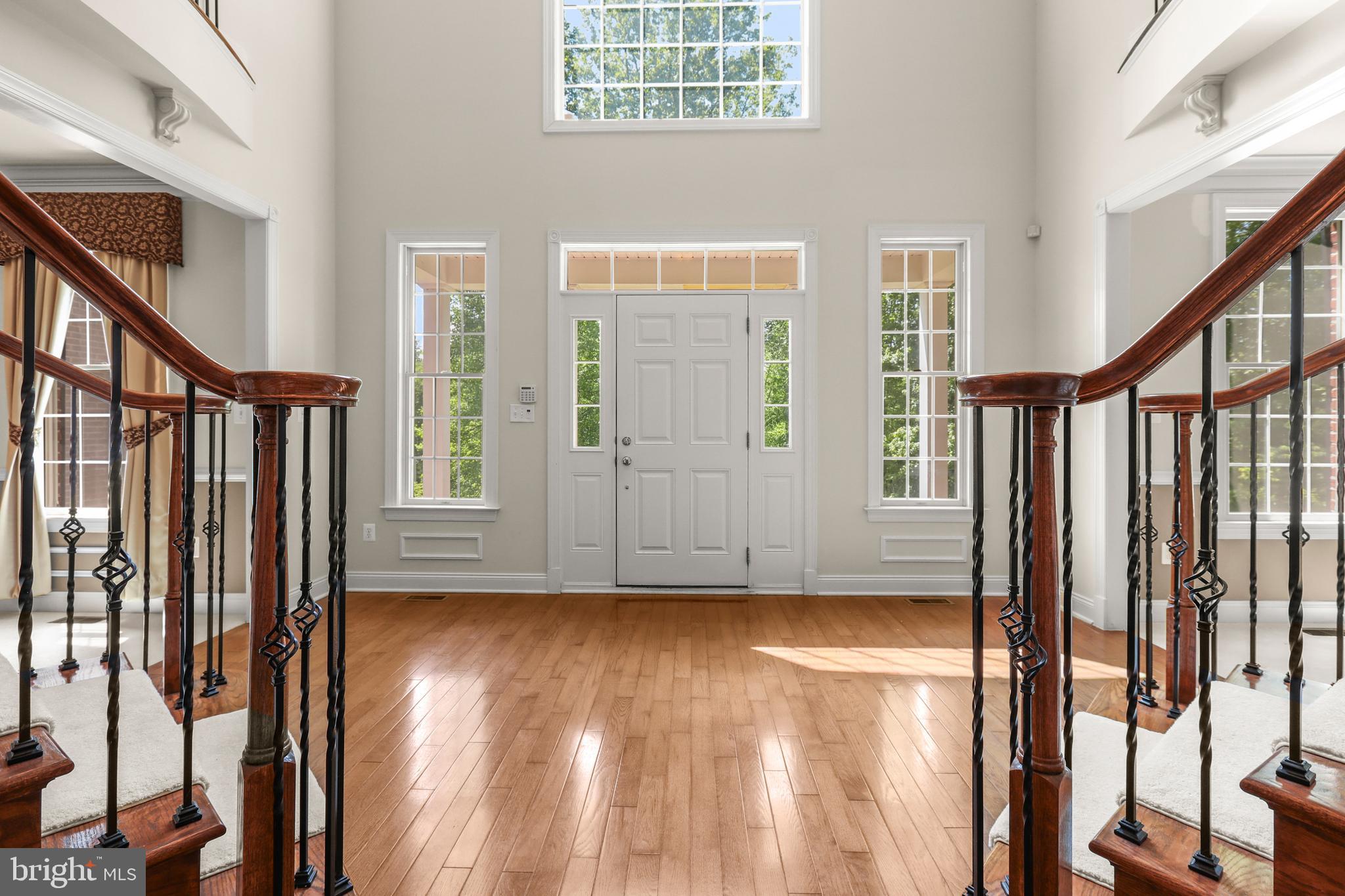 1601 Rushing Stream Court Forest Hill, MD 21050 - Photo 11 of 72 2-story foyer w/hardwood floors & palladium window