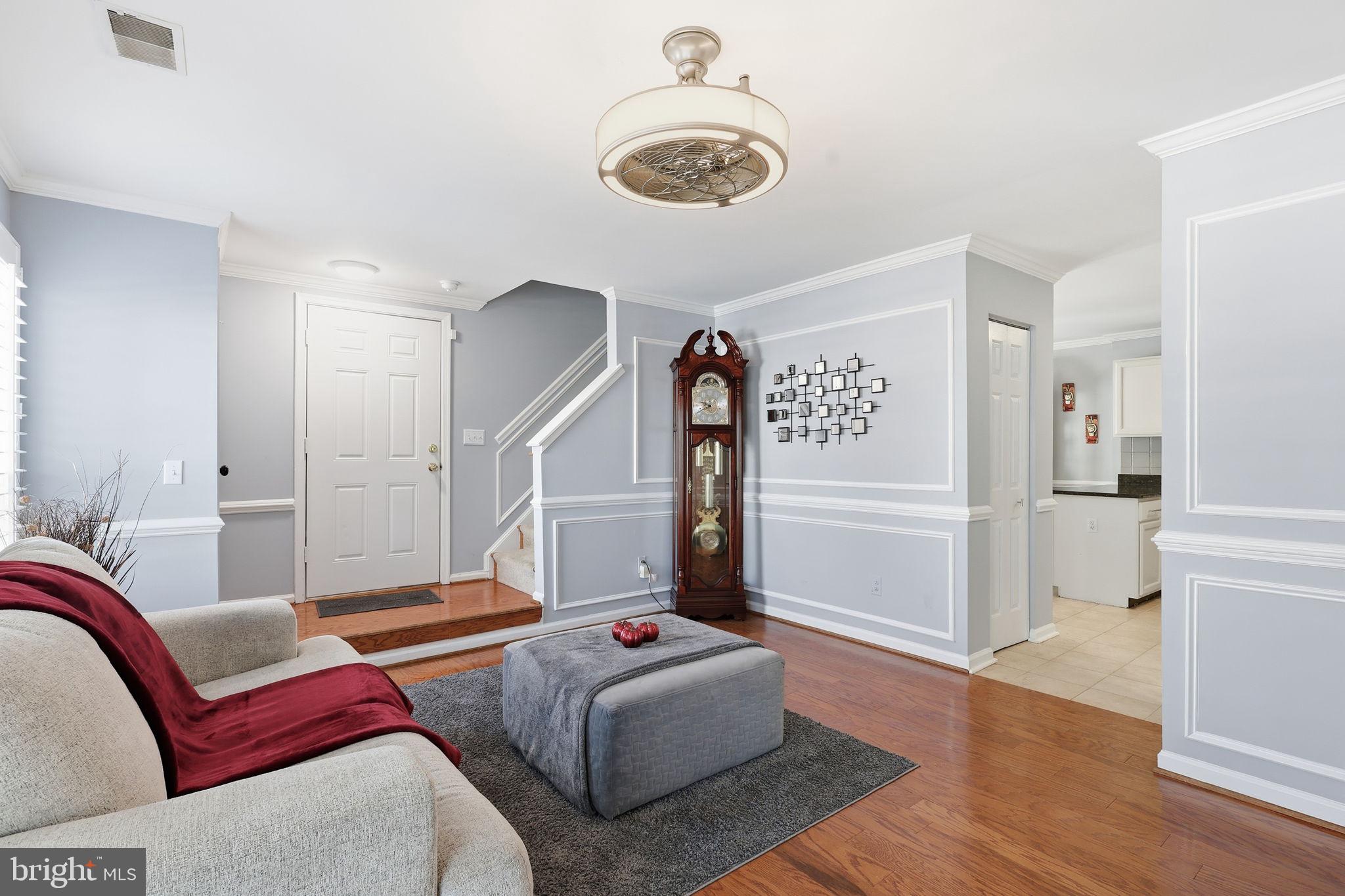 9332 Wax Myrtle Way Manassas, VA 20110 - Photo 10 of 40 a living room with furniture and a window