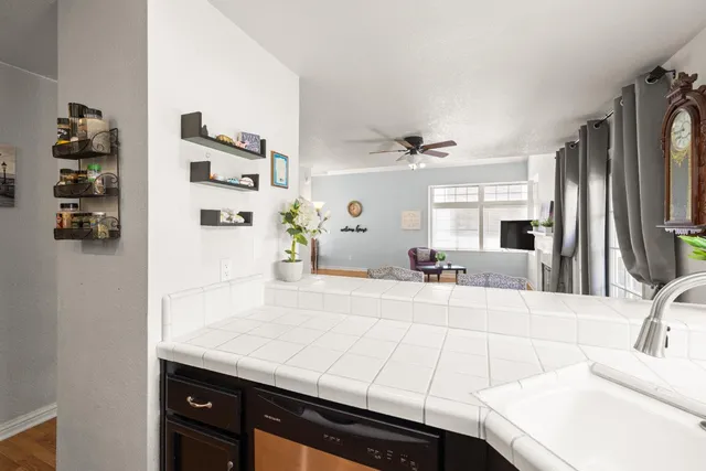 a room with a sink and furniture