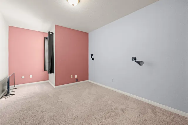 a view of a room with an empty space