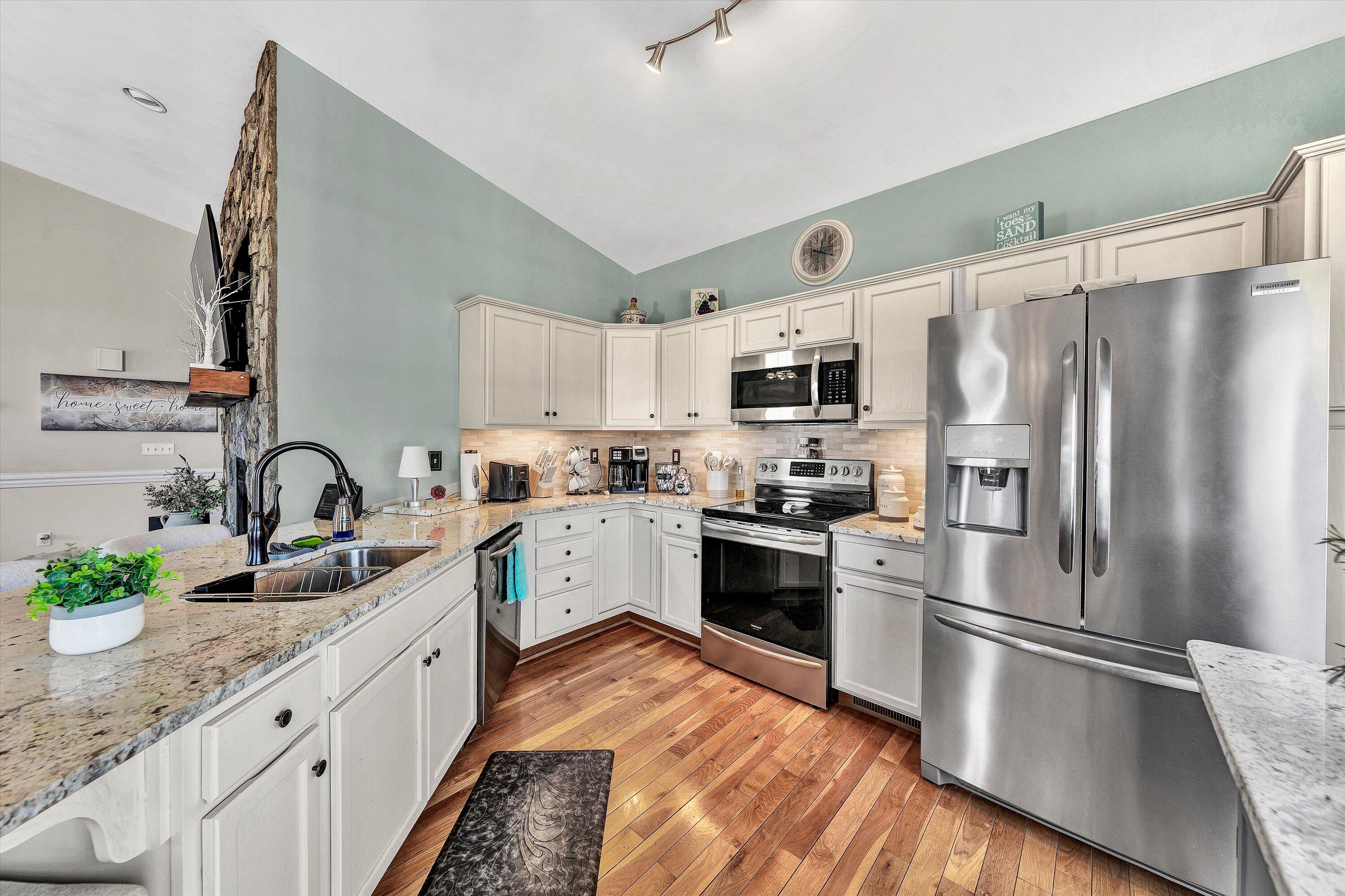 1615 Morewood Road Hardy, VA 24101 - Photo 13 of 46 a kitchen with granite countertop stainless steel appliances a sink a counter top space cabinets and stainless steel appliances