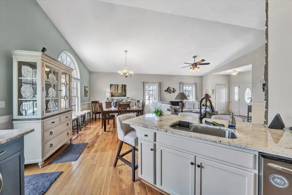 a very nice looking living room with wooden floor