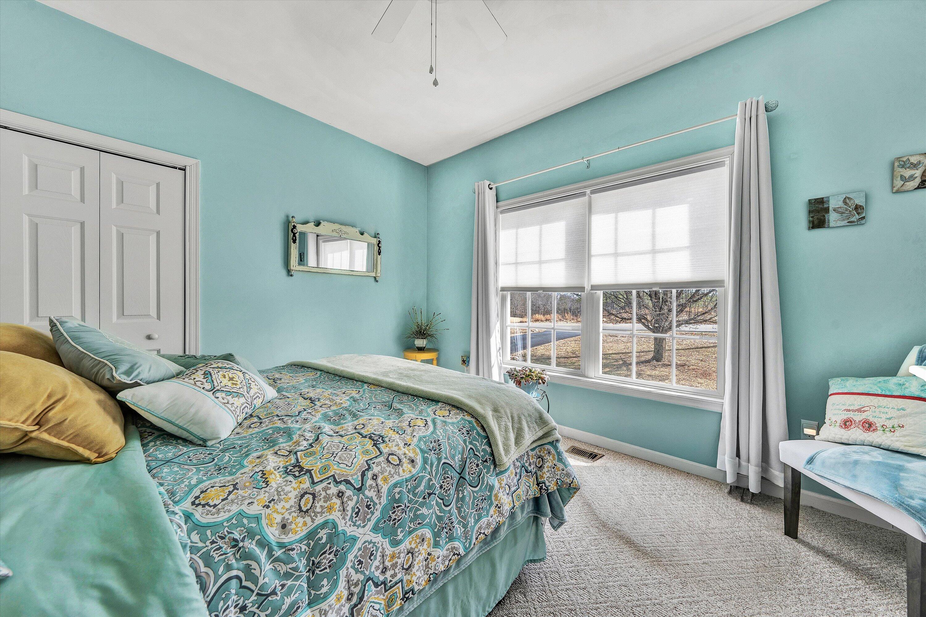 1615 Morewood Road Hardy, VA 24101 - Photo 16 of 46 a bedroom with a bed and a window