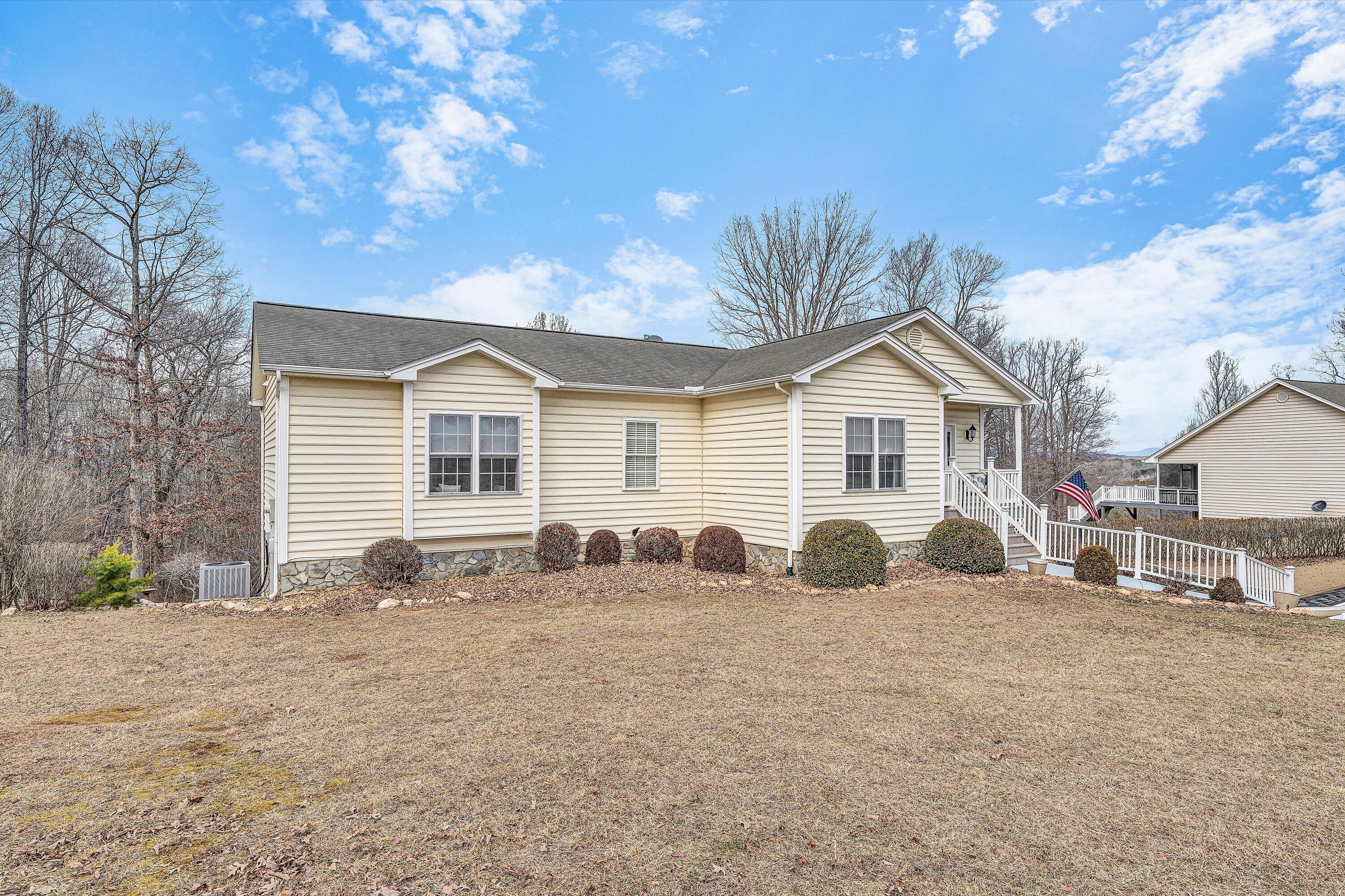 1615 Morewood Road Hardy, VA 24101 - Photo 2 of 46 a front view of a house with a yard