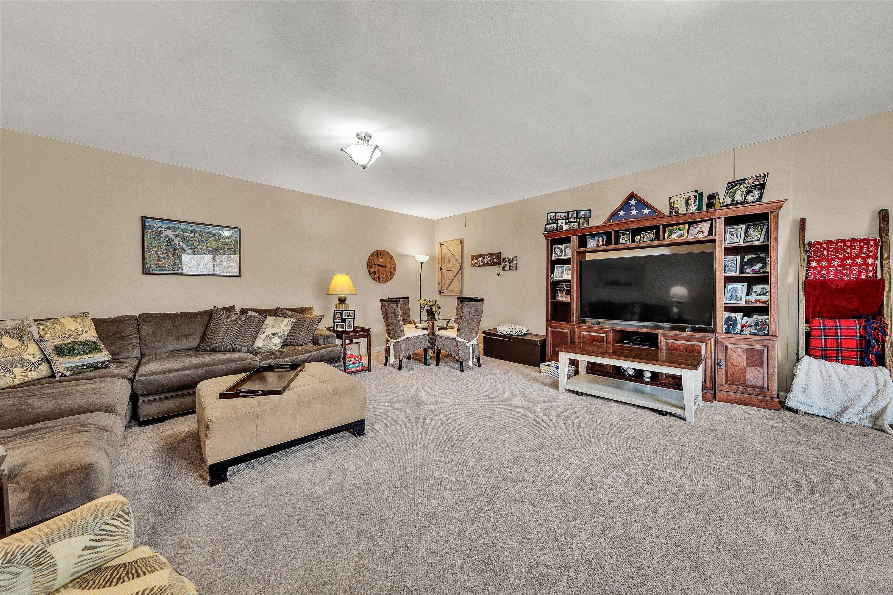 1615 Morewood Road Hardy, VA 24101 - Photo 25 of 46 a living room with furniture and a flat screen tv