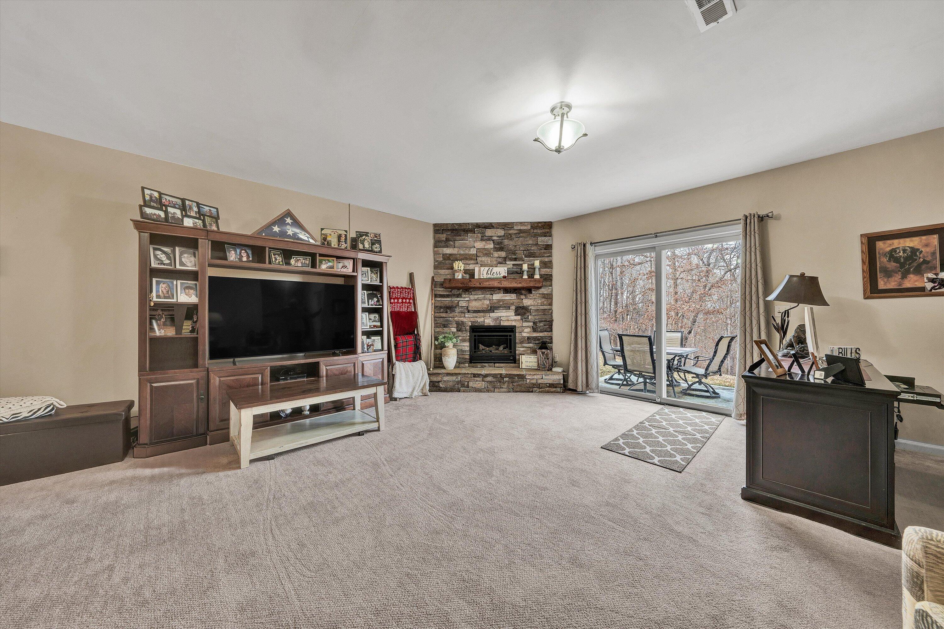 1615 Morewood Road Hardy, VA 24101 - Photo 27 of 46 a living room with furniture and a flat screen tv