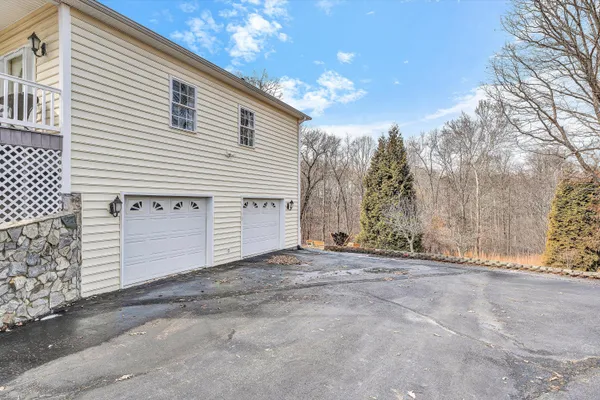 a view of a house with a garage