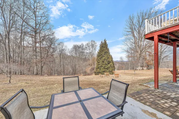 a view of a patio with a yard
