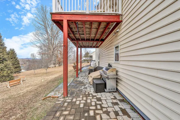 a backyard of a house with lots of green space
