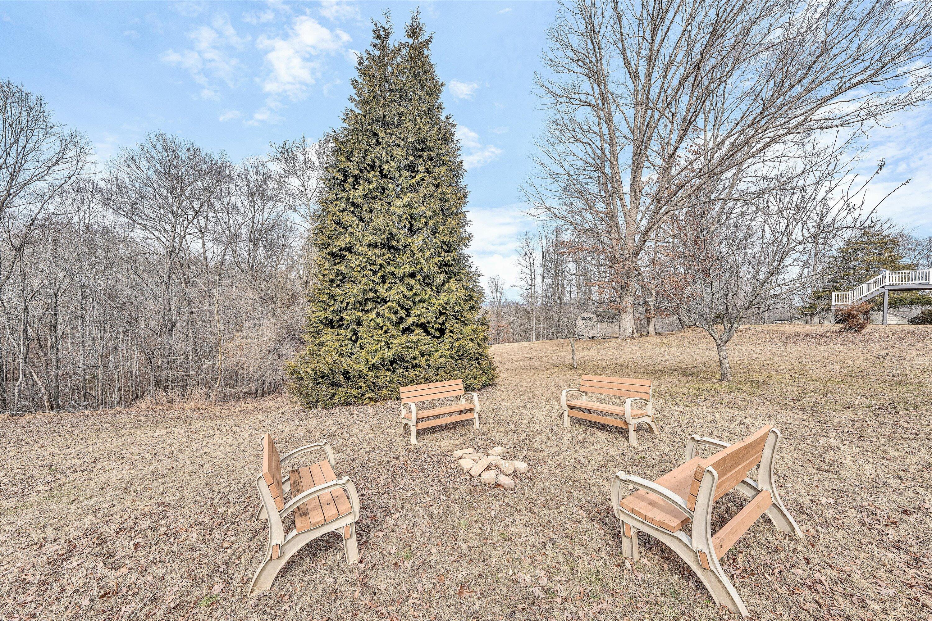 1615 Morewood Road Hardy, VA 24101 - Photo 41 of 46 a wooden bench sitting in middle of a yard