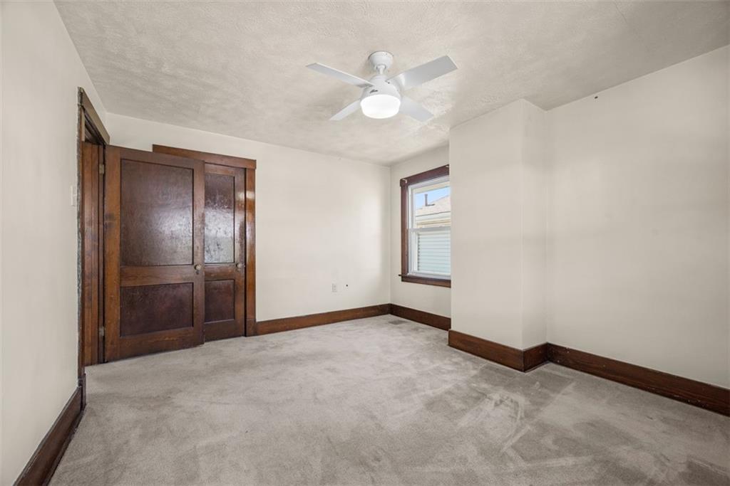745 6th Street Beaver, PA 15009 - Photo 17 of 36 an empty room with closet and windows