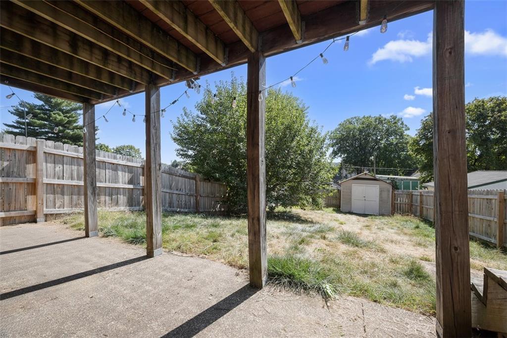 745 6th Street Beaver, PA 15009 - Photo 28 of 36 a view of a backyard with floor to ceiling window and wooden fence