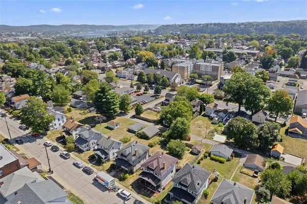 an aerial view of a city with lots of residential buildings