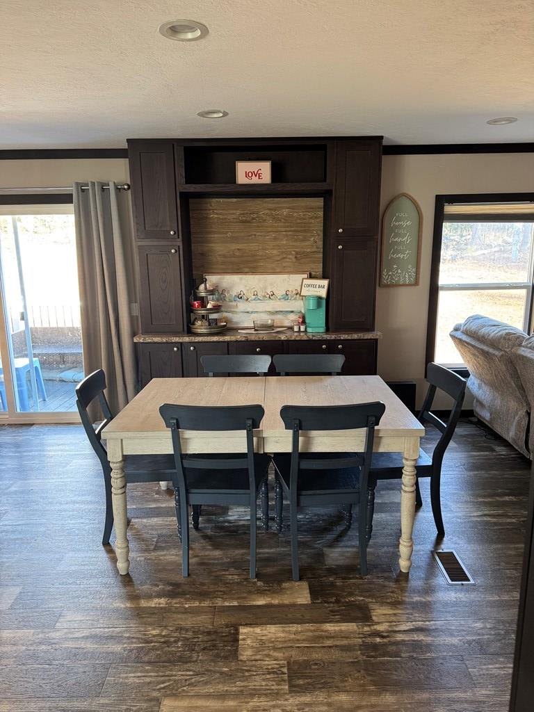 35 Bergan Moore Road Murphy, NC 28906 - Photo 13 of 18 a view of a dining room with furniture window and wooden floor