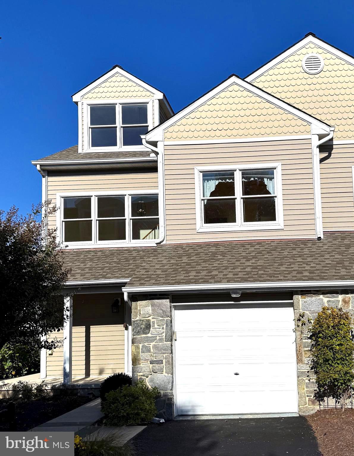 807 Auckland Way Chester, MD 21619 - Photo 1 of 42 a front view of a house with a yard