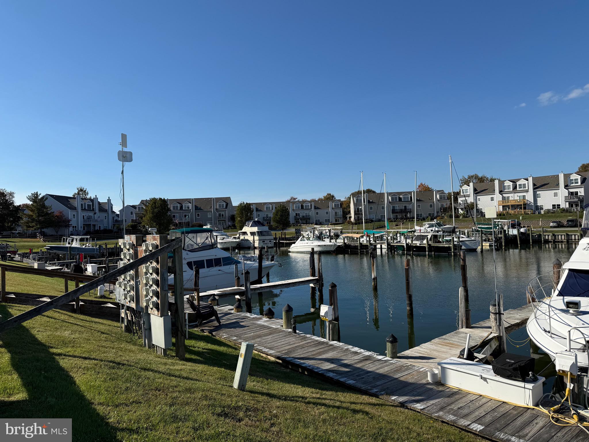 807 Auckland Way Chester, MD 21619 - Photo 38 of 42 a view of a lake with boats and trees