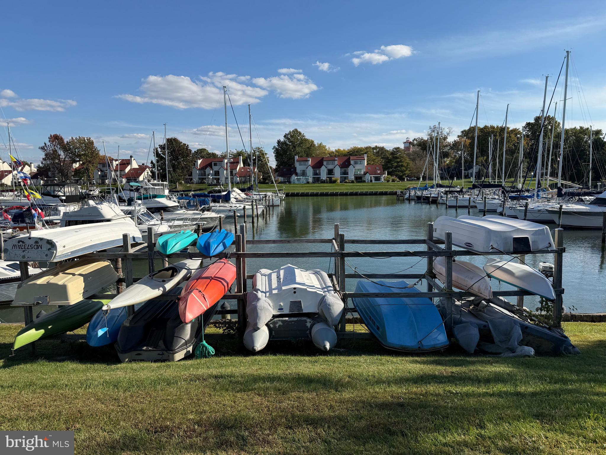 807 Auckland Way Chester, MD 21619 - Photo 39 of 42 a view of a house with a yard and a patio