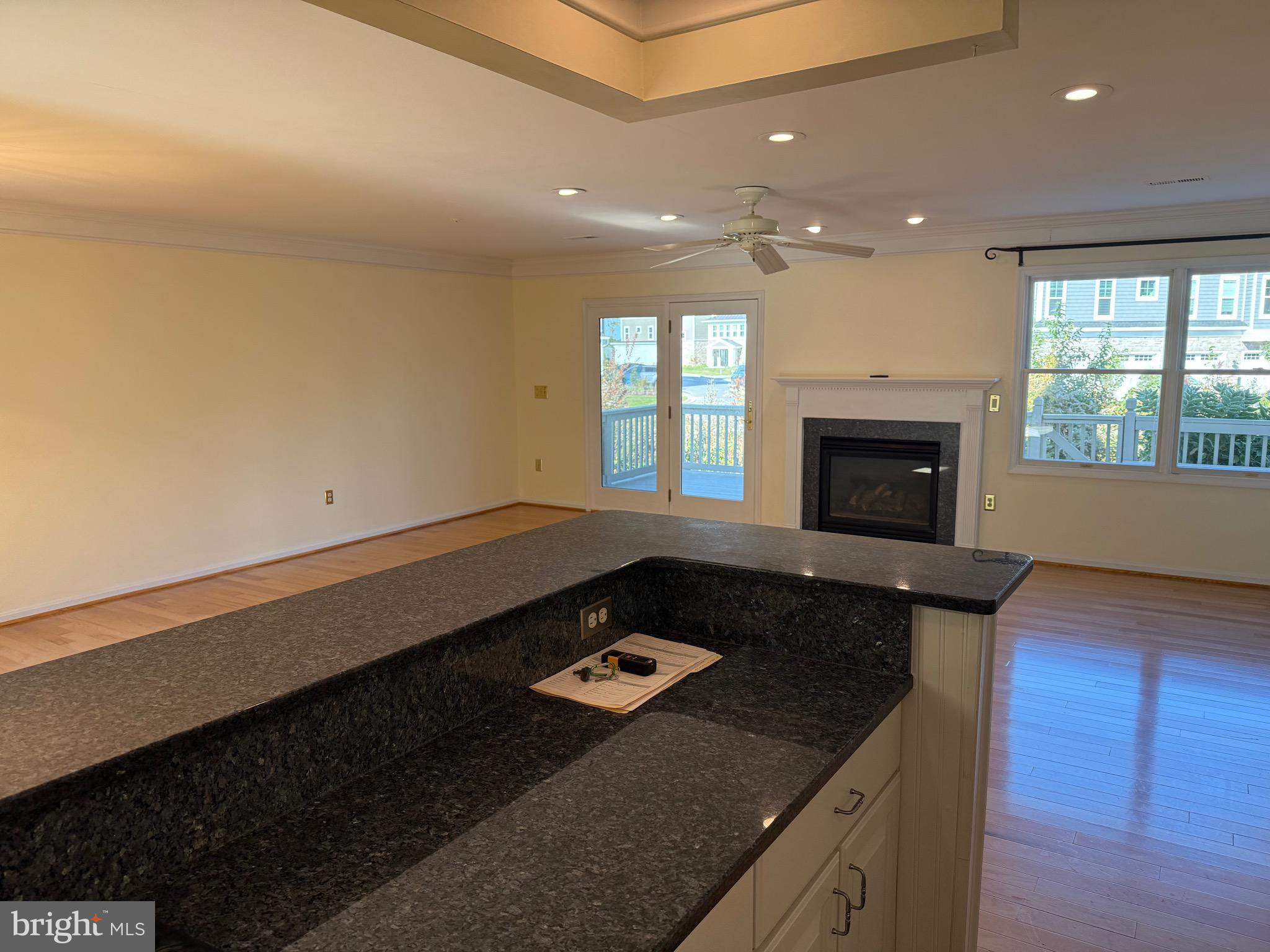 807 Auckland Way Chester, MD 21619 - Photo 7 of 42 a living room with furniture and a fireplace