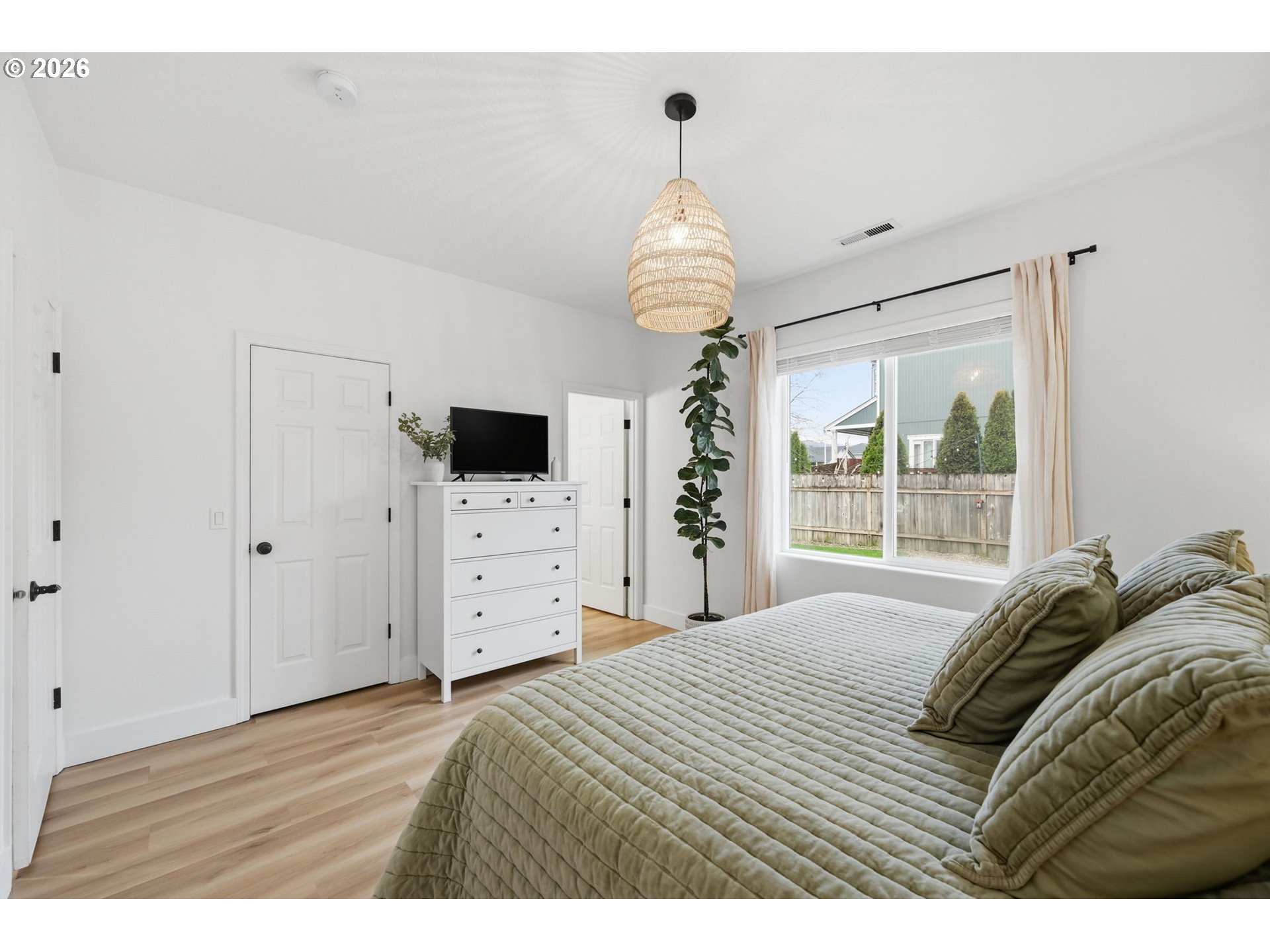109 Robin Court Creswell, OR 97426 - Photo 14 of 29 a bedroom with a bed and a flat screen tv