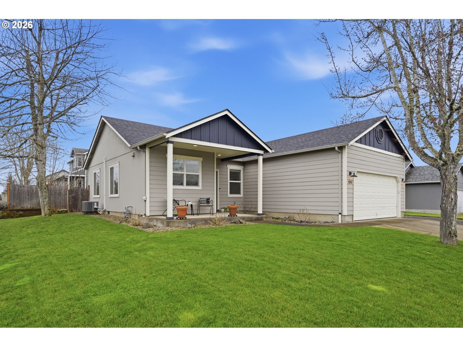 109 Robin Court Creswell, OR 97426 - Photo 28 of 29 a front view of a house with a yard and garage